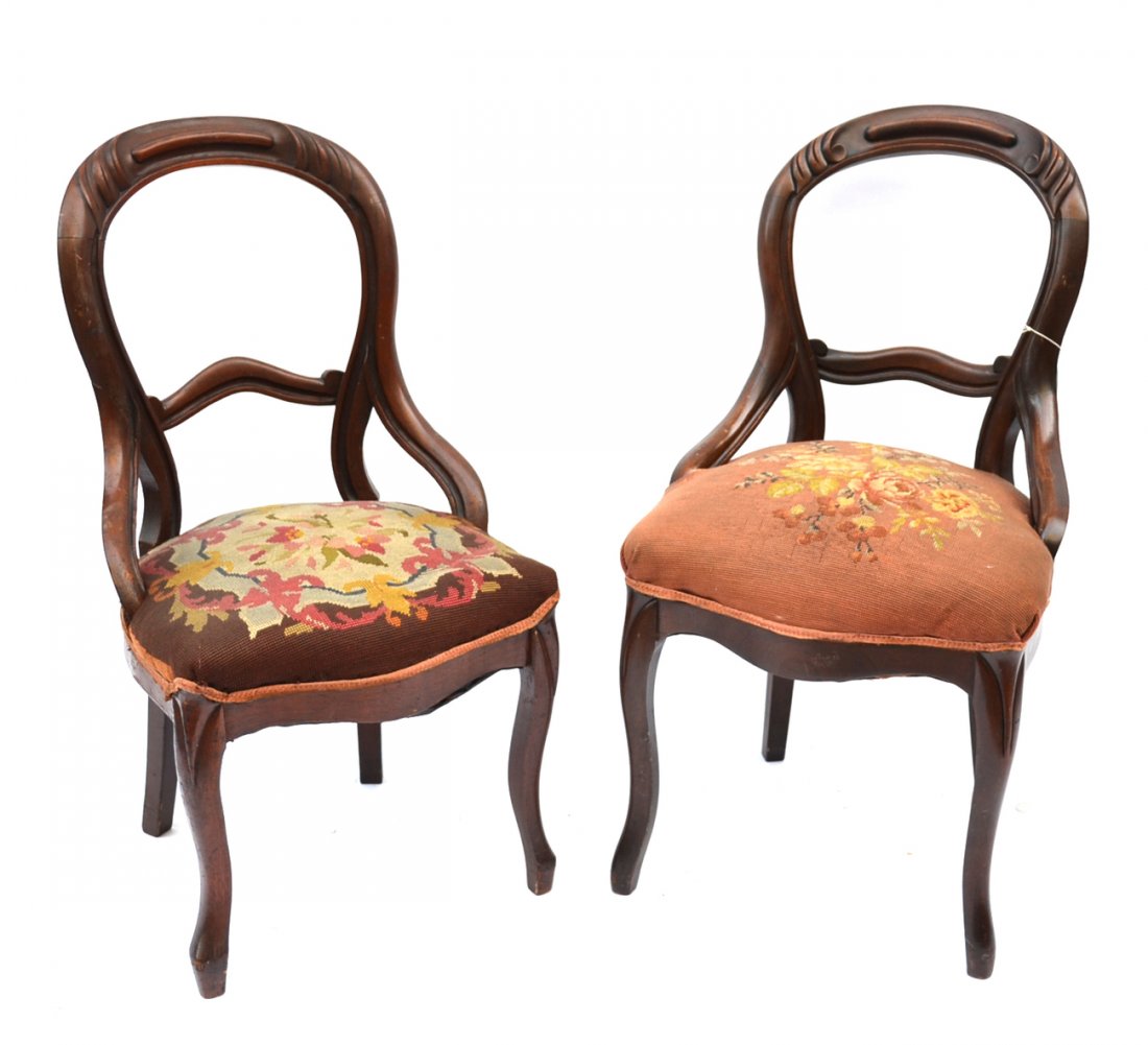 Two American Empire Needlepoint Chairs: Mahogany balloon-back side chairs with floral needlepoint seats. [Taller: 19 1/4" W x 20 1/2" D x 35 5/8" H (21" H to seat)]. Upholstery worn.