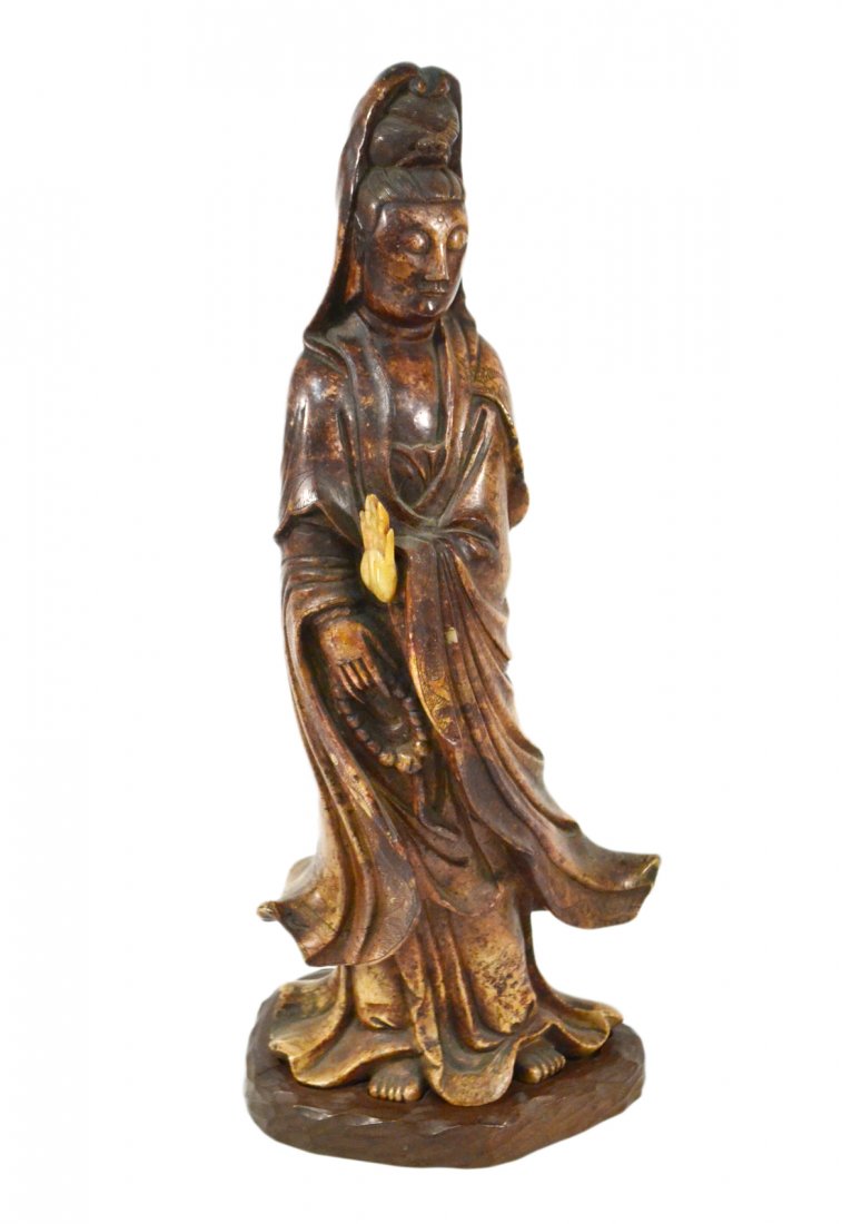 Chinese Hardstone Quan Yin Figure: Standing full-length depiction of the Buddhist deity Quan Yin. [8 1/4" W x 4" D x 18" H]. Few small chips.