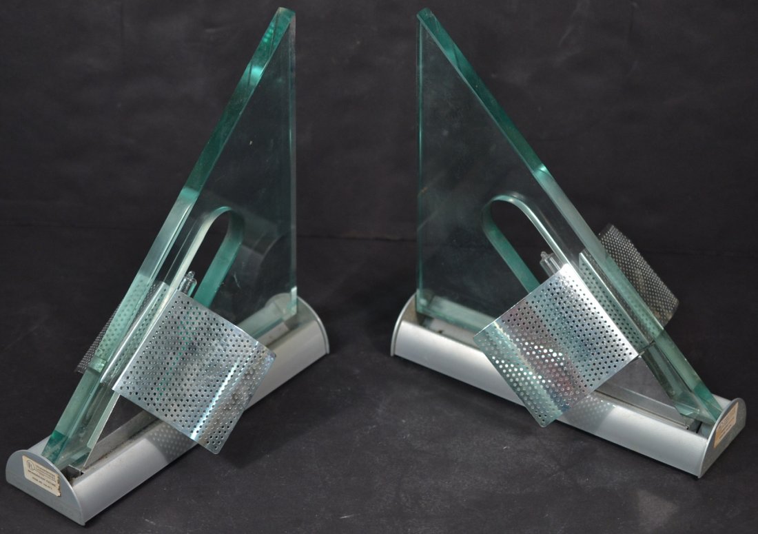 Pair of Artemide "Icarus" Sconces: Designed by Carlo Forcolini. [10" H]. In good condition.