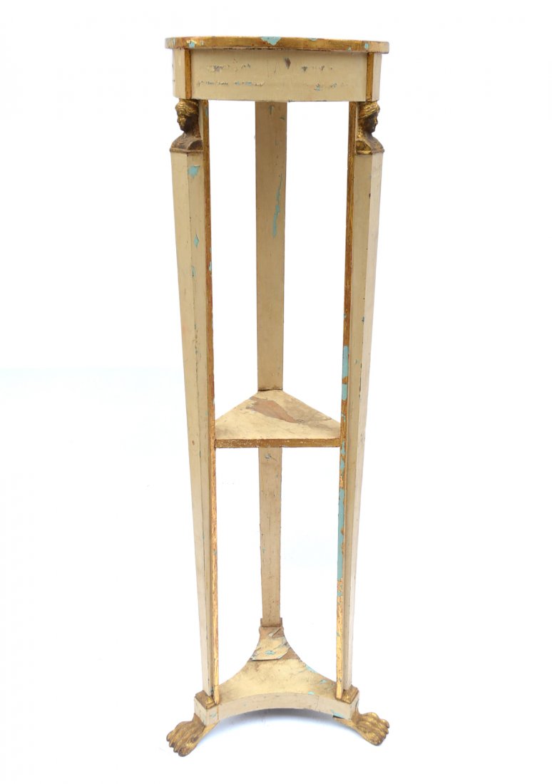 French Empire Pedestal: Painted and gilt wood with gilt caryatid and lion paw elements. [16" dia. x 58 1/2"H]. Significant losses to paint, but complete.