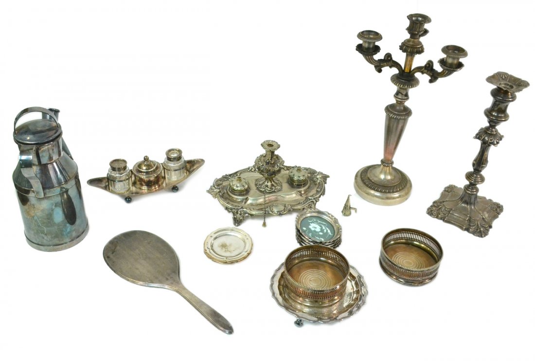 Assorted Silver-Plated Articles: Includes: Two inkstands, candelabrum, pair bottle coasters, mirror, candlestick, and more. 20 pieces.