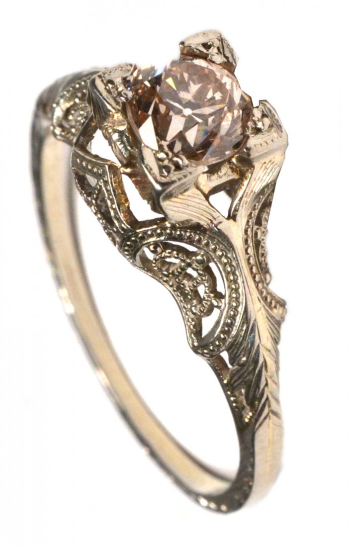 18k White Gold & Diamond Engagement Ring: Solitaire round cut diamond. Good condition. 1 dwt inclusive.