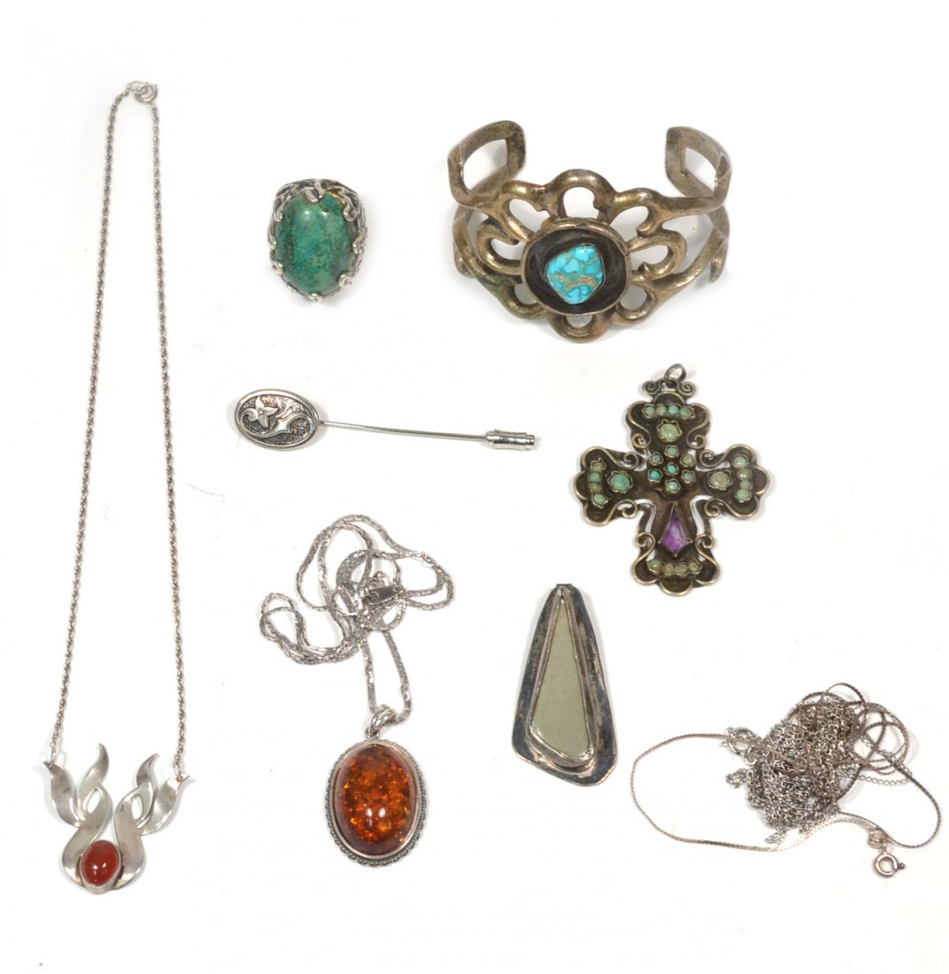 Assorted Sterling Jewelry: Includes Native American bracelet, Mexican crucifix, amber pendant, and more. 8 pieces. 3.2 ozt inclusive