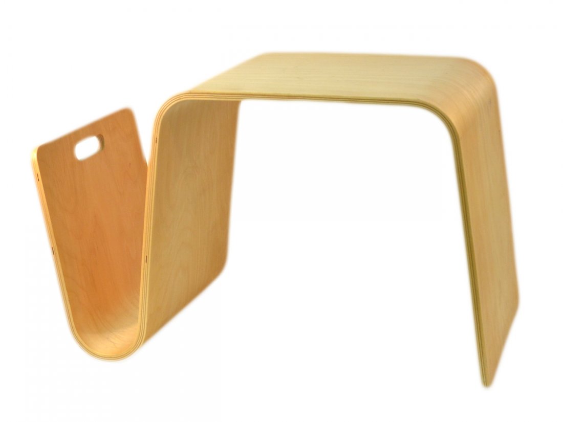 Modern Occasional Table/Magazine Rack: Bent plywood low table with integral magazine rack. [25 1/2" W x 13 3/4" D x 16 1/4" H]. Light wear, scuffs, and scratches.