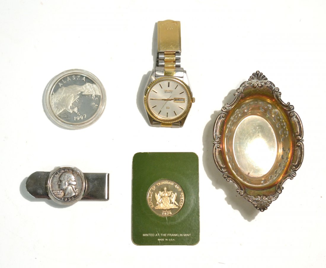 Five Pieces Assorted Jewelry: Seiko watch, quarter money clip, Alaskan coin, one hundred dollar gold coin, and a silver sugar bowl.