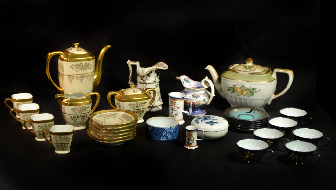 Vintage & Antique Porcelain Tea Articles: Comprises: 1.) Set of 6 Rosenthal silver deposit cups and saucers with daffodil design. 2.) Gilt creme Bavarian porcelain partial set with four demitasse cups, six saucers, creamer, sugar bowl, and te