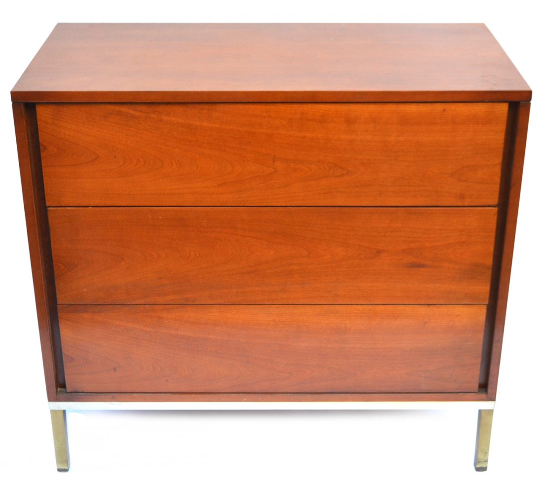 Mid-Century Modern John Stuart Chest: Three-drawer chest on satin nickel base with brass feet. [35 3/4" x 17 3/4" x 33 1/4"]. Light wear.