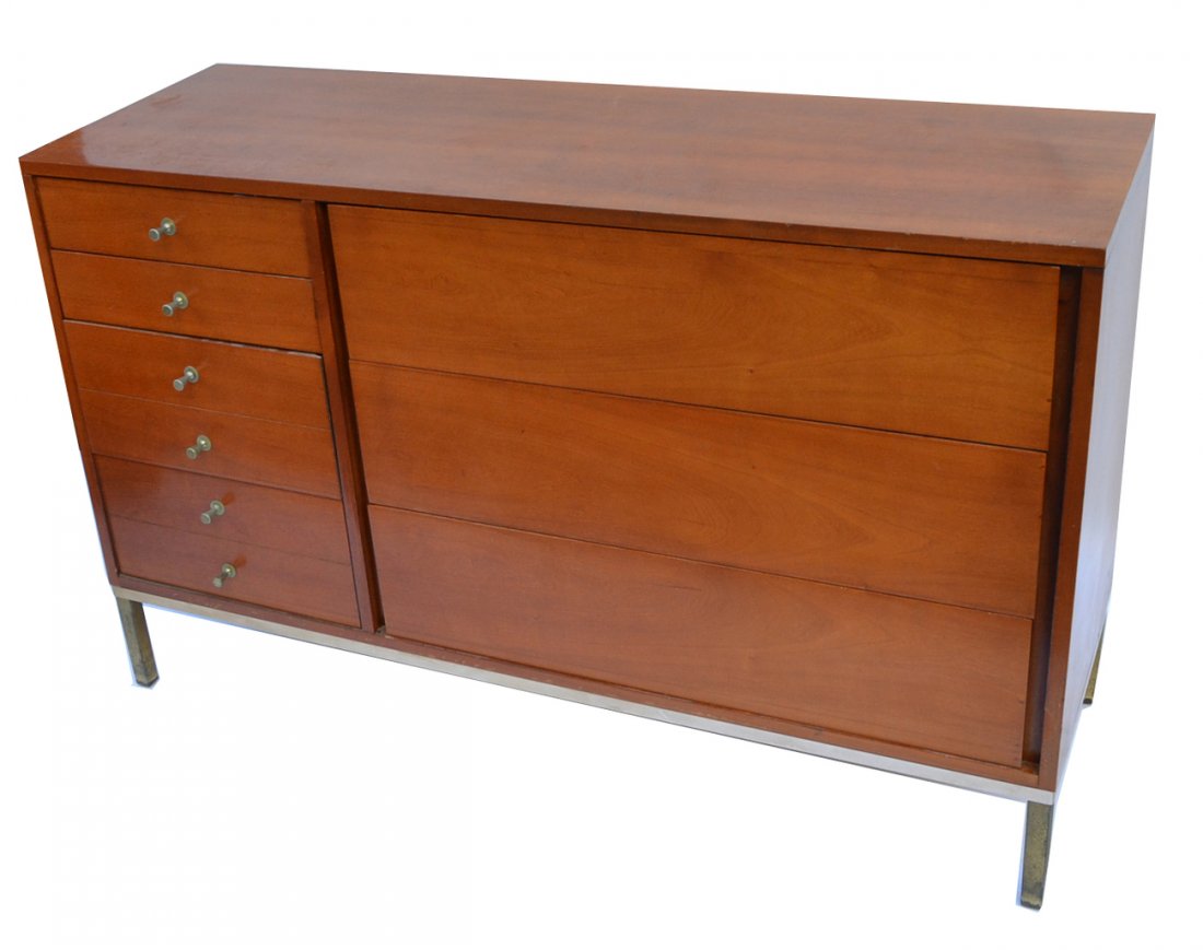 Mid-Century Modern John Stuart Chest: Seven-drawer chest with satin nickel pulls and base on brass-finish legs. [53" W x 18" D x 33 1/8"]. Light wear with oxidation on legs.