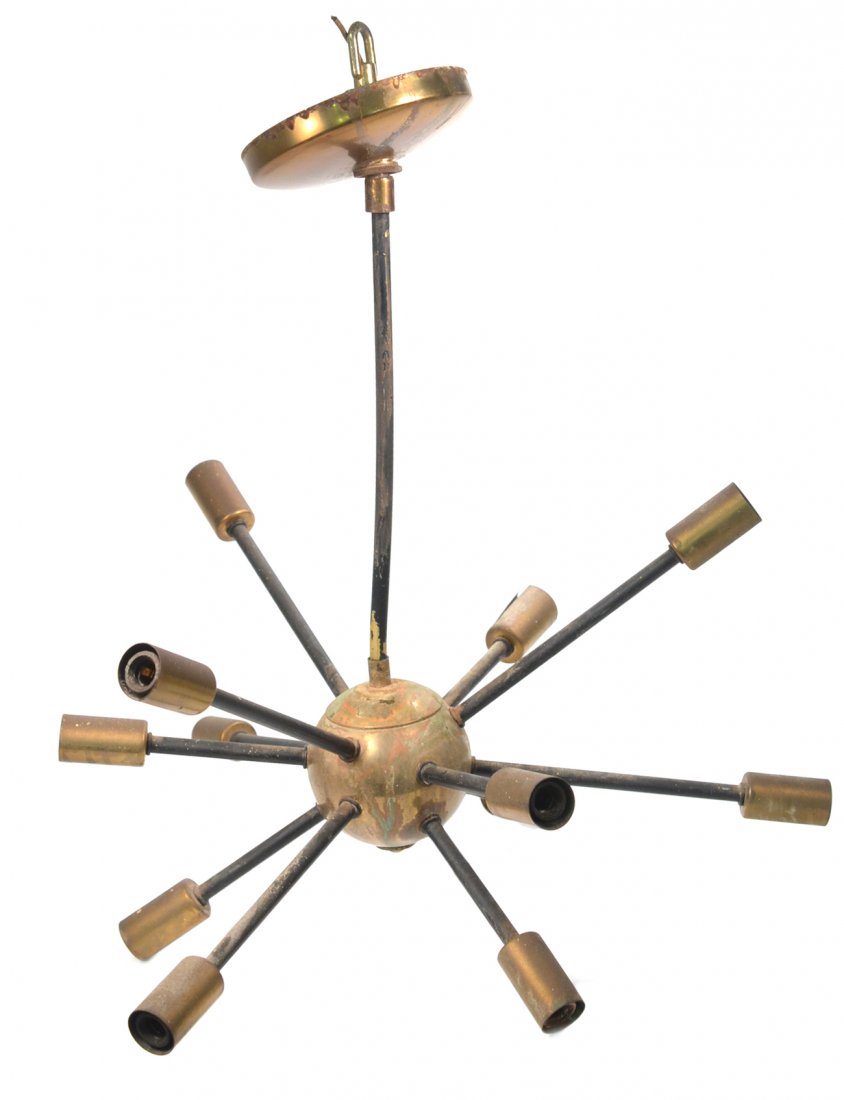 Mid-Century Modern Sputnik Fixture: Brass and black painted steel ceiling fixture with 12 lights. [23" Dia x 19" High]. Oxidation and wear to finish.