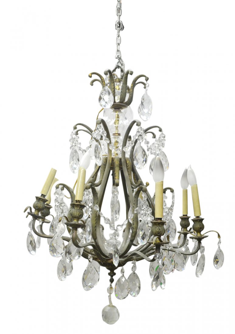 Eight-Light Bronze Fixture: Eight-light bronze fixture with crystal prisms. [32 1/2" H x 25-26" Dia]. Some prisms missing.