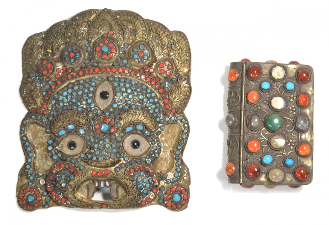 Two Asian Decorations: Comprises mask and book-form box. Both set with stones and glass. [7" W x 8" H]. Both with losses.