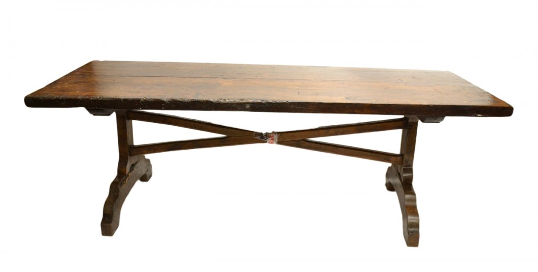 Country Trestle Table: Antique oak with through-tenon construction. Top bears three truss rods to tighten tongue joint lengthwise at center. [88 1/2" W x 33" x 30 1/4" H]. Good condition.