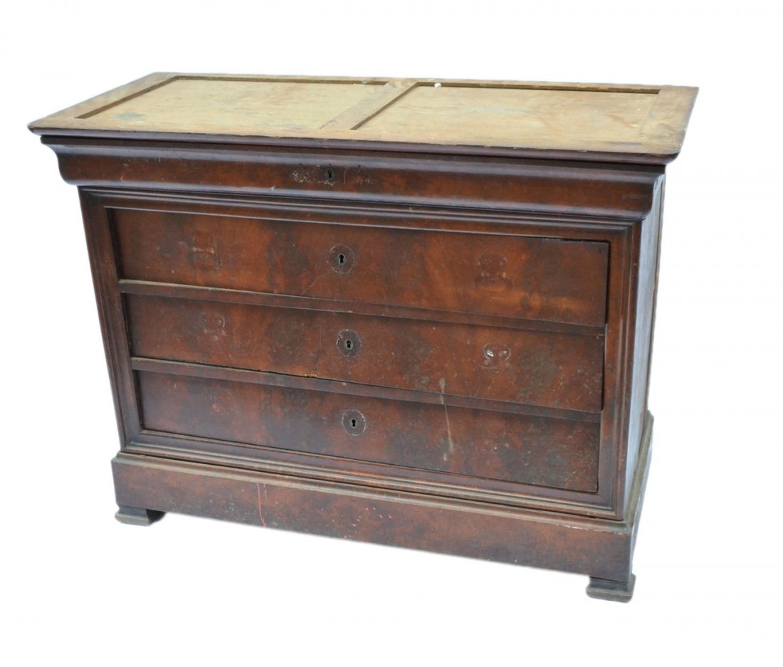 American Empire Chest of Drawers: 4 drawer chest with matched mahogany veneer on pad feet. [49 1/2" W x 21 3/4" D x 37 1/8"]. Missing marble and escutcheons. Wear with veneer loss and cracks on sides.