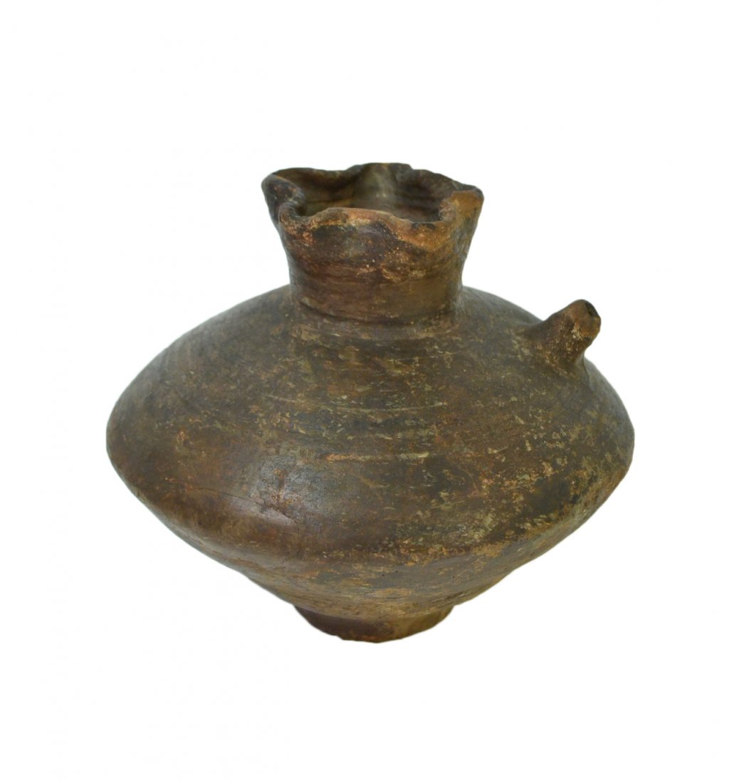 Ancient Egyptian Spouted Vessel: Earthenware coil-formed spouted vessel with pinched star-shape rim on ringed foot. [7 5/8" Dia x 7 3/4" H]. Bottom previously repaired.