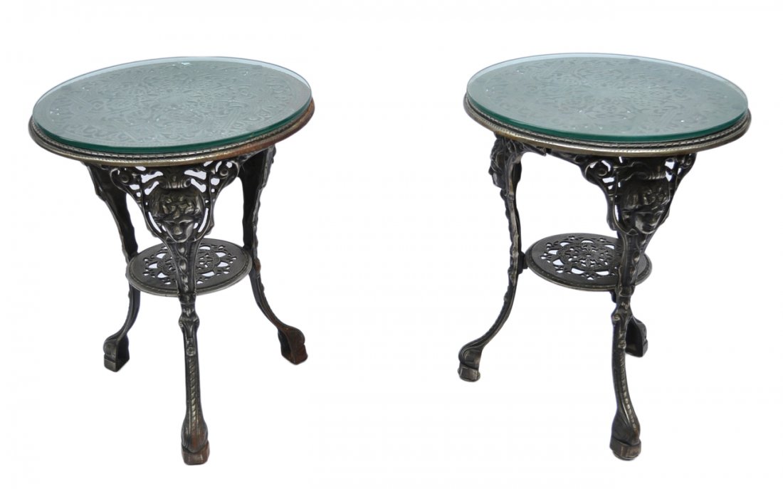 Pair of Iron Bistro Tables: Pair of two-tier reticulated round tables. [23 1/2" Dia x 28" H]. Good condition.