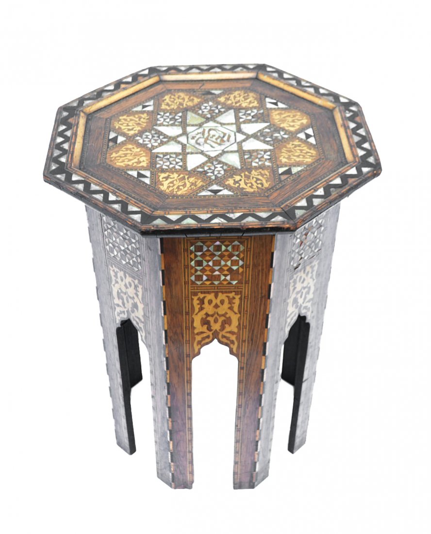 Syrian Octagonal Tea Table: With elaborate wood and mother-of-pearl inlaid top and base. Some losses to shell inlay, otherwise in good condition. [18 7/8" x 18 7/8" x 24" H].