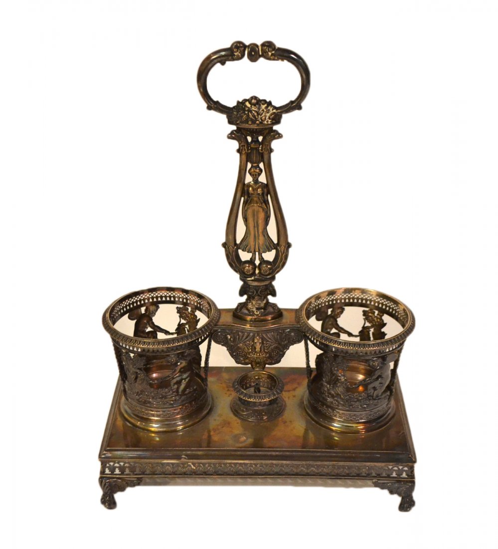Antique French Silver Bottle Stand: Elaborately chased cruet with classical ornamentation. Stand lacks bottles but otherwise in good condition. 21 ozt.