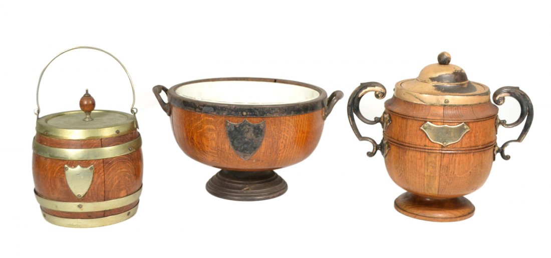 3 English Oak Table Articles: Comprises: Silver plate mounted biscuit barrels and a salad bowl. [Largest 9 1/4" D x 6" H]. Significant wear.