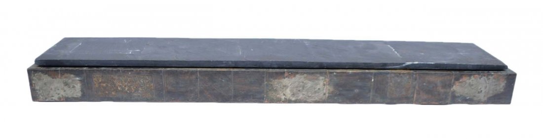 Paul Evans Brutalist Wall Console: Patinated metal-clad console with slate top. Manufactured by Directional, 1970's. Some scratches and scuffs to slate top, otherwise good condition. [72" W x 13 1/4" D x 6" H].