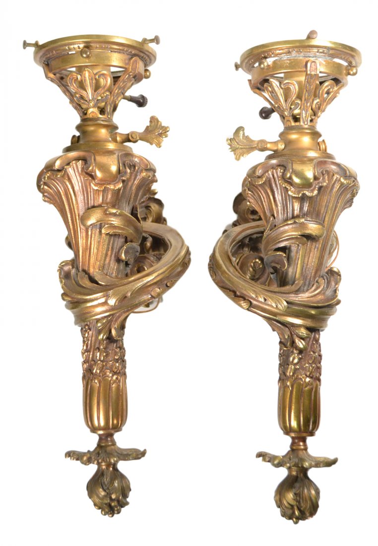 E. Mottheau, Pair of Torch Form Sconces: Pair of bronze classical style sconces. Marked "E. Mottheau Paris". [8" L x 16" H]. Good condition