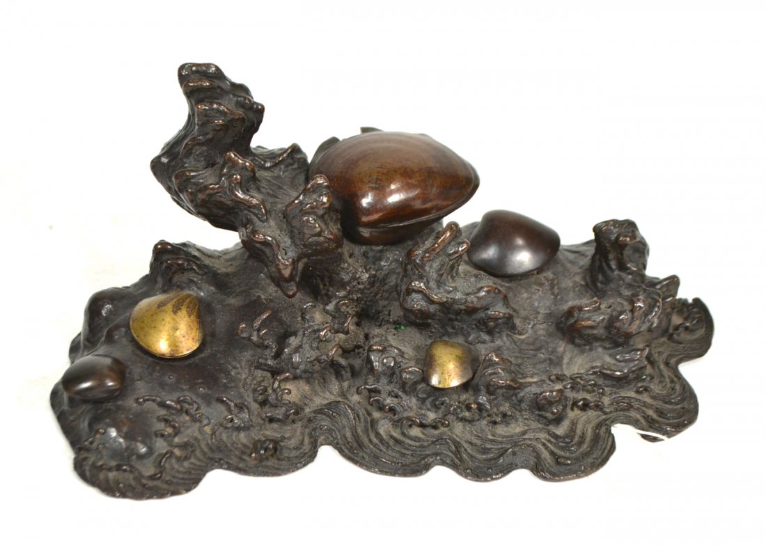 Japanese Meiji Bronze Marine Group: Depicts a seabed with stylized waves and shellfish. Brown patina with gold highlights. [11" W x 7" D x 5" H]. A bit of oxidation and one missing element on a larger clamshell.