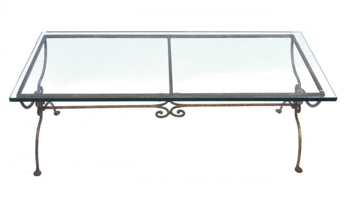 Gilt Metal Cocktail Table: Cocktail table having open work design on the stretcher and sides.