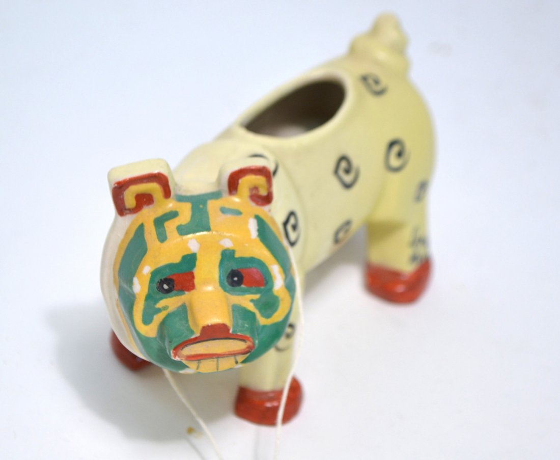 Louis Wain Ceramic Bulldog Spill Vase: Depicts a whimsical figure of a standing bulldog with highly stylized face. Signed on leg. Stamped on base "Made in England/Rd. No. 638315. Some wear to enamel decoration on face. [5 1/2" W x 2 1/4" D