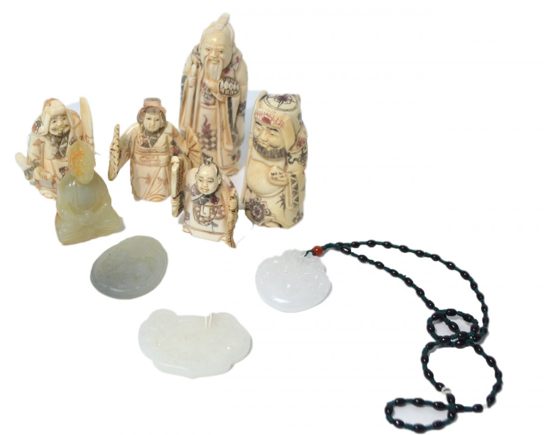 Nine Asian Decorations: Five miniature bone figures, a quartz figure, and three medallions (including one mutton fat jade pendant). [Tallest: 4 1/2"; Largest length: 2 1/4"].