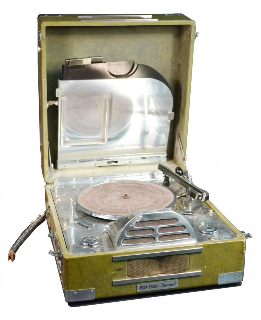 Vintage RCA Victor Special Phonograph: Machine-Age modern aluminum and chrome phonograph contained within a simulated green leather case. [15 7/8" W x 17 1/4" D x 8 3/4" H]. Untested, sold "as is".