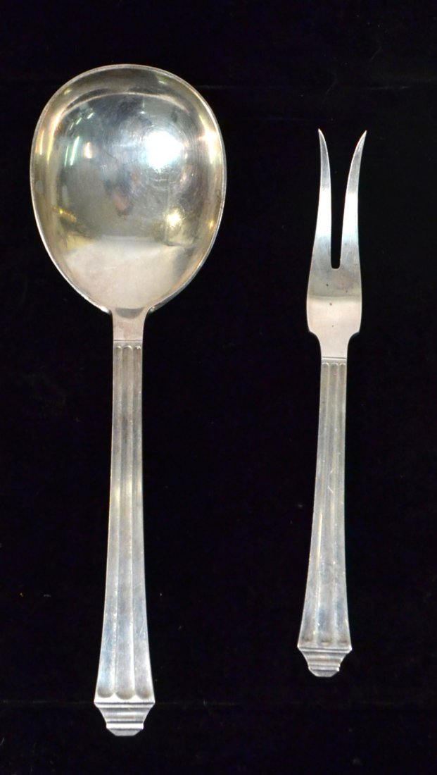 Two Hans Hansen Sterling Servers: Comprises serving spoon and two tine fork. [Larger: 9 3/8", 5.17 ozt]. Good condition.