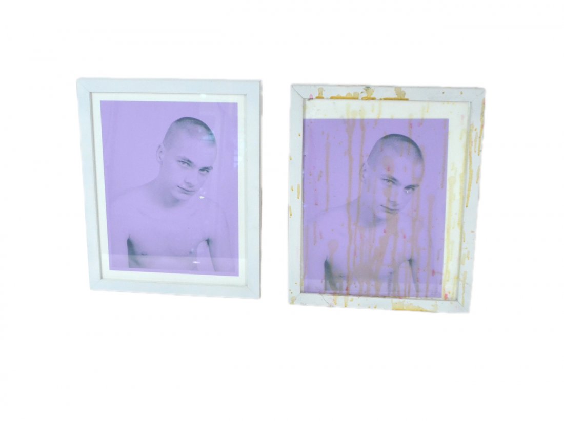 Terence Koh, two digital prints: Titled "Untitled 3". Two framed images of a young man in a bust-length 3/4 profile pose with a single gun shot hole. Both signed on verso "AsianPunkBoy June 2003". [Images: 11" H x 8 1/2" L] on larger