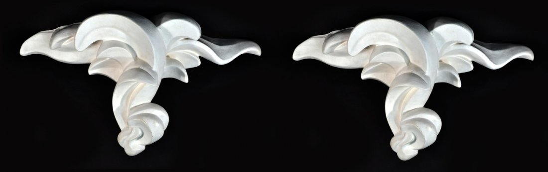 Pair of Consoles, Manner of Serge Roche: Pair of matching wall consoles. Each plaster console in foliate form. [29" W x 10" D x 13 7/8"]. Some losses to paint and plaster, but overall good condition.