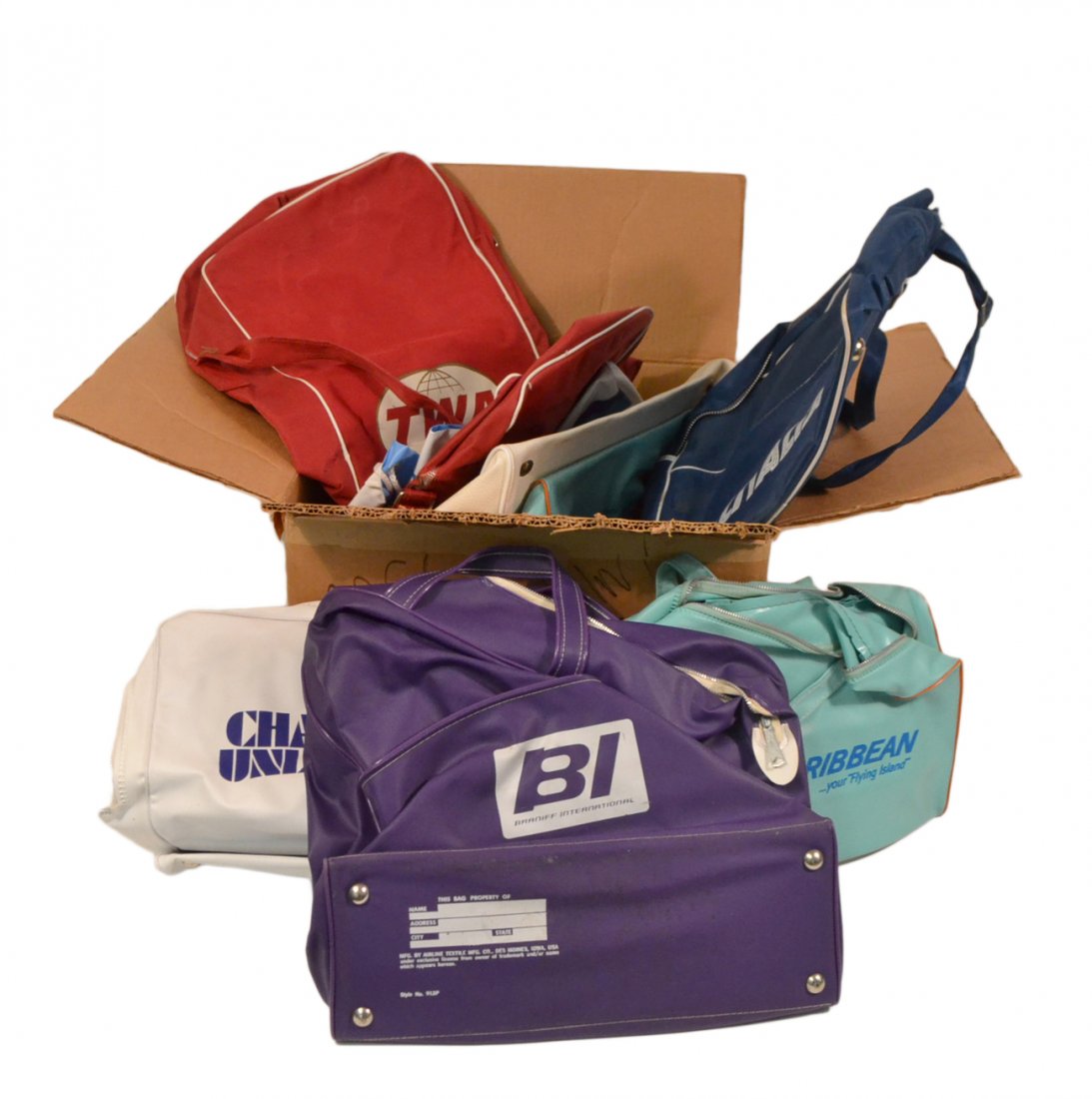 10+ Vintage Travel Bags: Includes bags from Al Italia, TWA, Braniff, Eastern Airlines, Trans Caribbean, and others. All sold "as is".