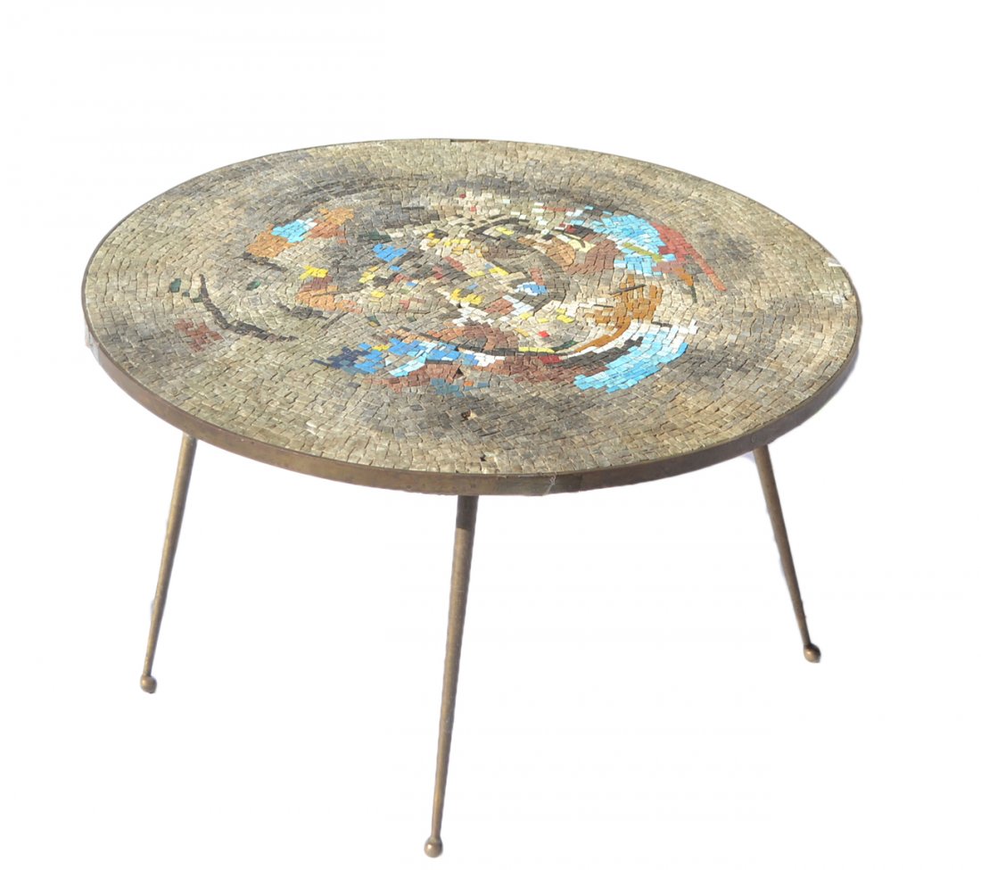 Round Tile Table: Decorated tile inset table with brass legs. [31" Dia x 16 3/4" H]. Some missing tiles, loose construction.