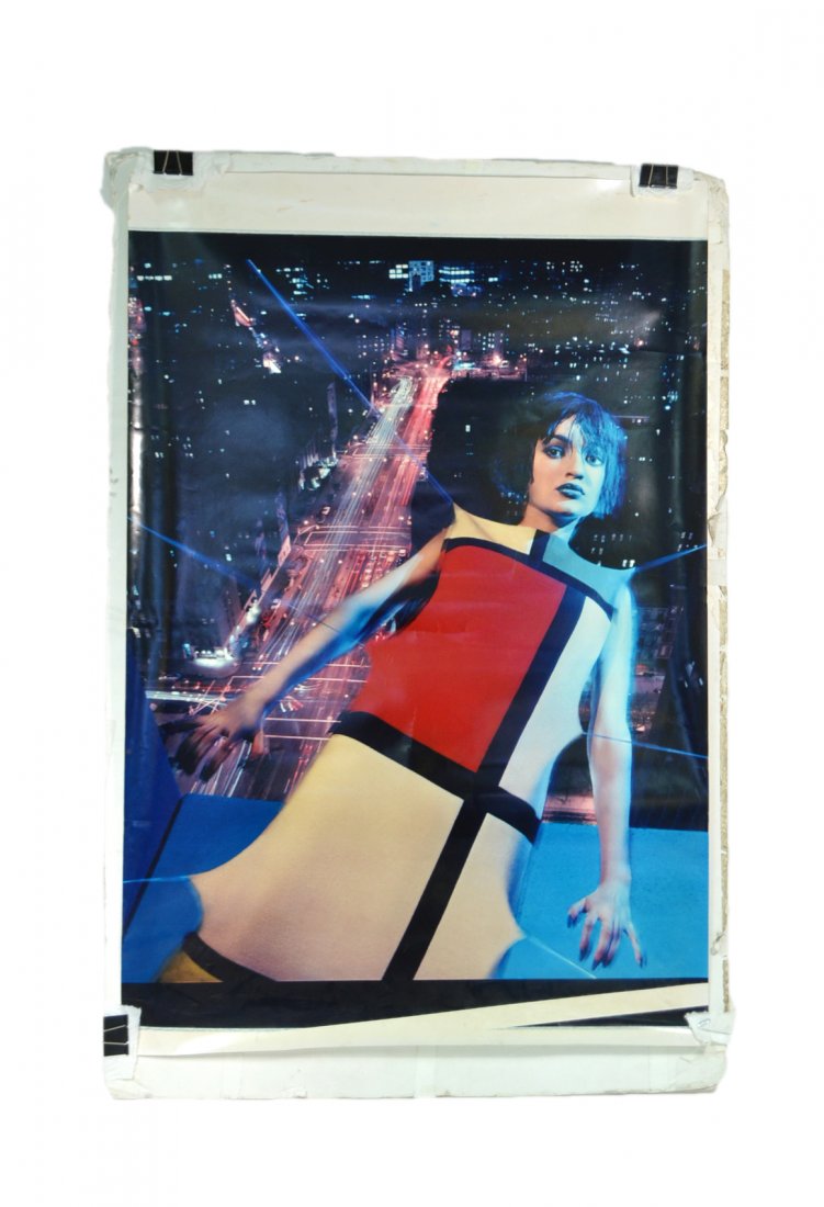 J. Albertini Photo, YSL Model: Depicts a model in the iconic "Mondrian" dress against a NYC night scene. Digital C-print. Accompanied by book "Yves St. Laurent: 40 Years of Creation" in which the photograph appears on page 143. [44