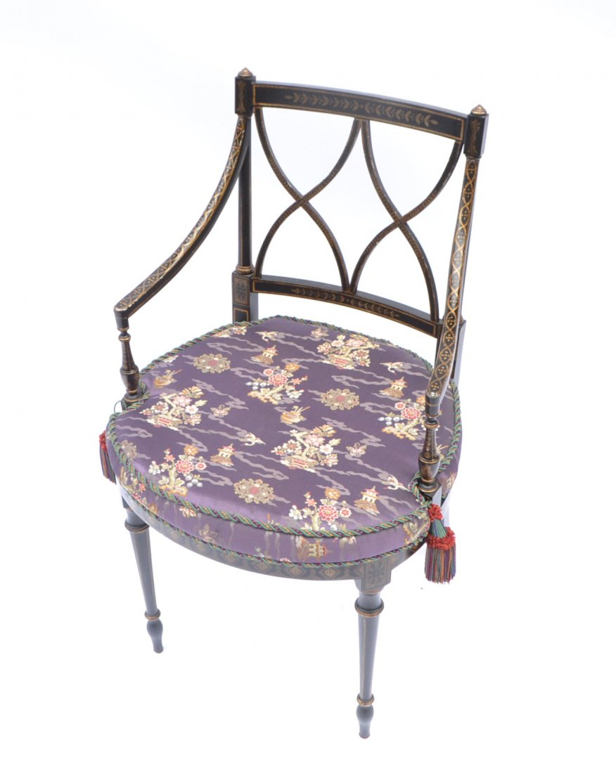 Regency-Style Ebony Chair: Black and gilt decorated armchair with X-form back. [34 1/2" H to back x 19" W x 17" inside arms; 19" to seat]. Some paint loss.