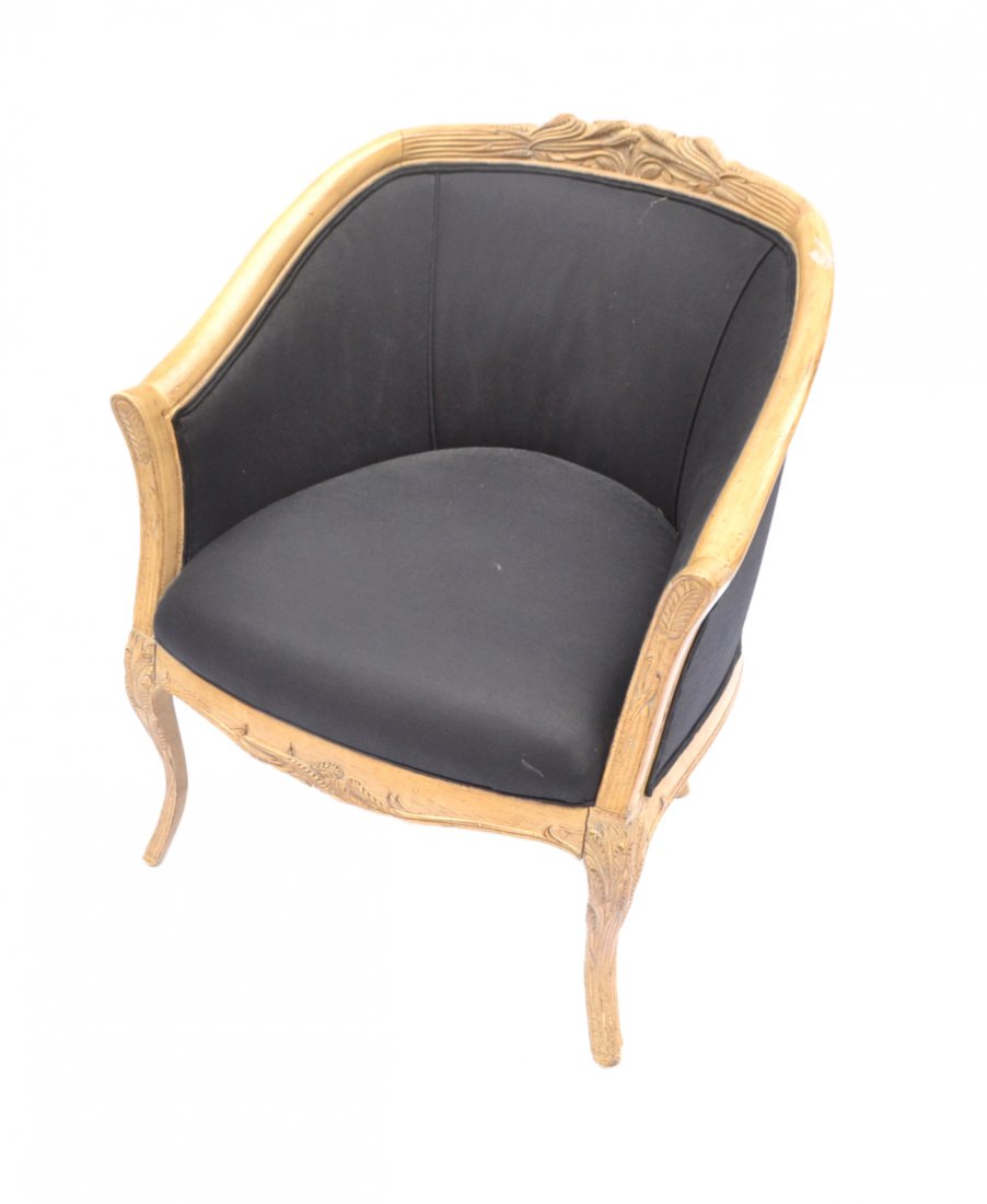 Creme Decorated Bergère: Decorated bergère with black upholstery. [33 1/4" H x 29" W x 22" (inside arms) x 18 1/2" to seat]. Some soiling to upholstery.