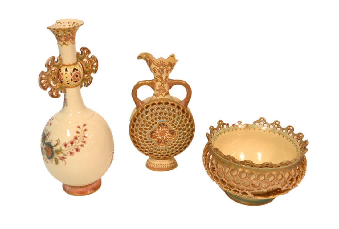 Three Zsolnay Porcelain Vases: Includes two double walled reticulated examples. [Largest: 9" H]. All sold "as is".