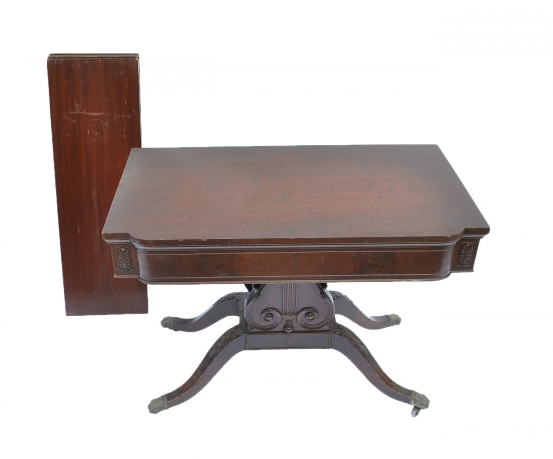 Regency-Style Flip-Top Console: Mahogany console convertible to dining table, with lyre-form base. [38" W x 21" D x 29 1/2" H]. Three leaves. Scratches, scuffs and repairs.