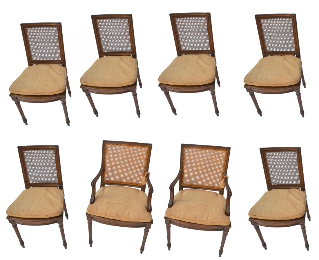 Set of 8 Louis XV-Style Dining Chairs: Comprises 2 armchairs and 6 side chairs, each with caned backs and square backs and seats. With reeded legs and shaped apron. [Armchair: 23" W x 20" D x 37 1/2" H; 19" to seat]. Scratches, scuffs and
