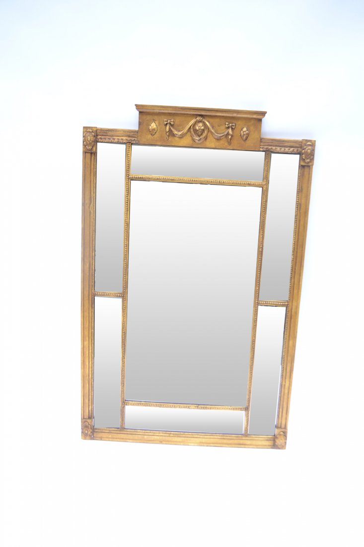 Gilt Classical Mirror: Antique gilt wood mirror with beaded and rosette motif. [32 1/2" W x 50" H, approx.]. Overall good condition.