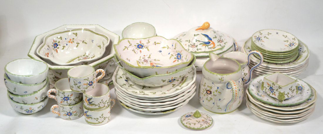 Assembled Earthenware Dinner Service: Assembled French earthenware dinner service of foliate and lined decoration. Most pieces are marked "Moustiers Fait Main". Service comprises of: covered tureen, 8 dinner plates, 7 luncheon plates, cre