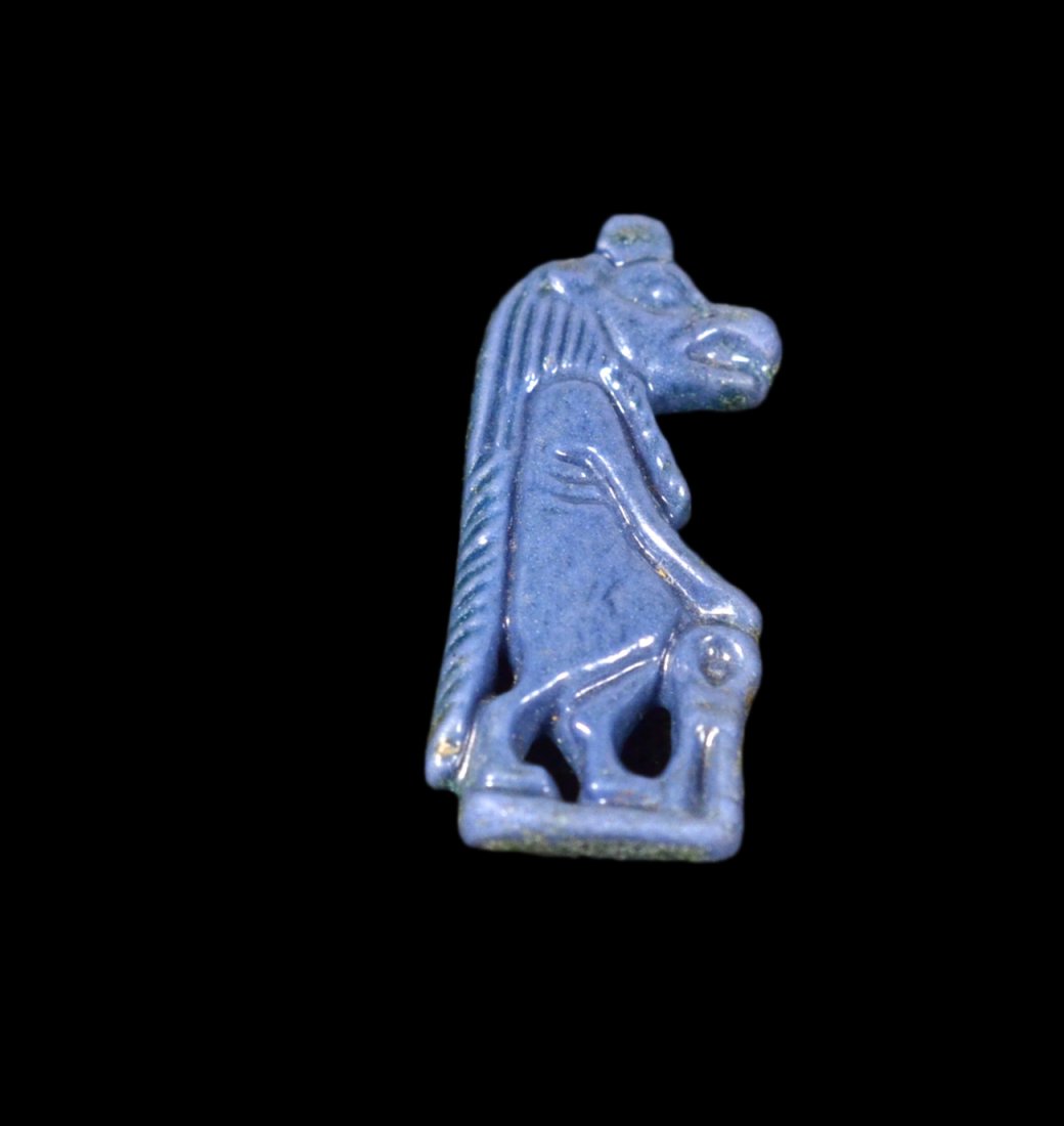 Ancient Egyptian Faience Taweret Bead: Blue faience figural amulet/bead representing Taweret, the Goddess of Childbirth, dating to late New Kingdom / 3rd Intermediate Period (1550-712 BC). [1 1/4" L]. Good condition.