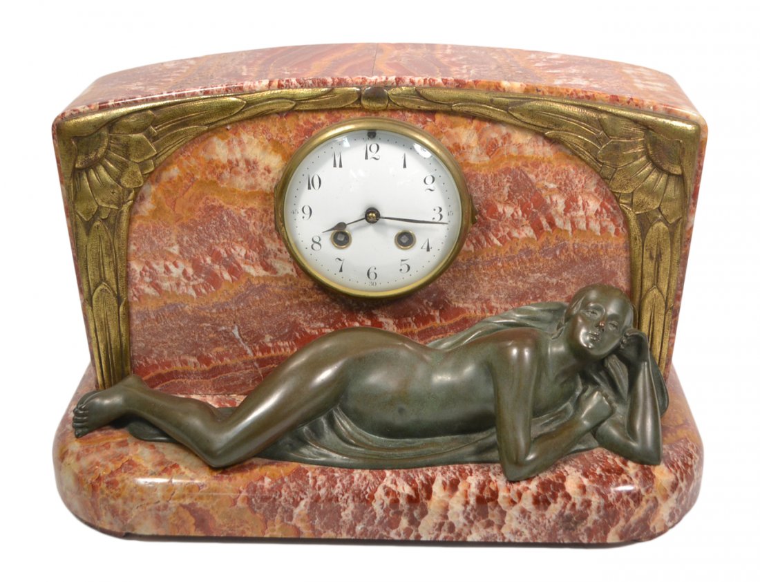 Figural Mantle Clock: Rouge marble clock with a reclining nude female sculpture. [16" W x 7 1/2" D x 10" H].