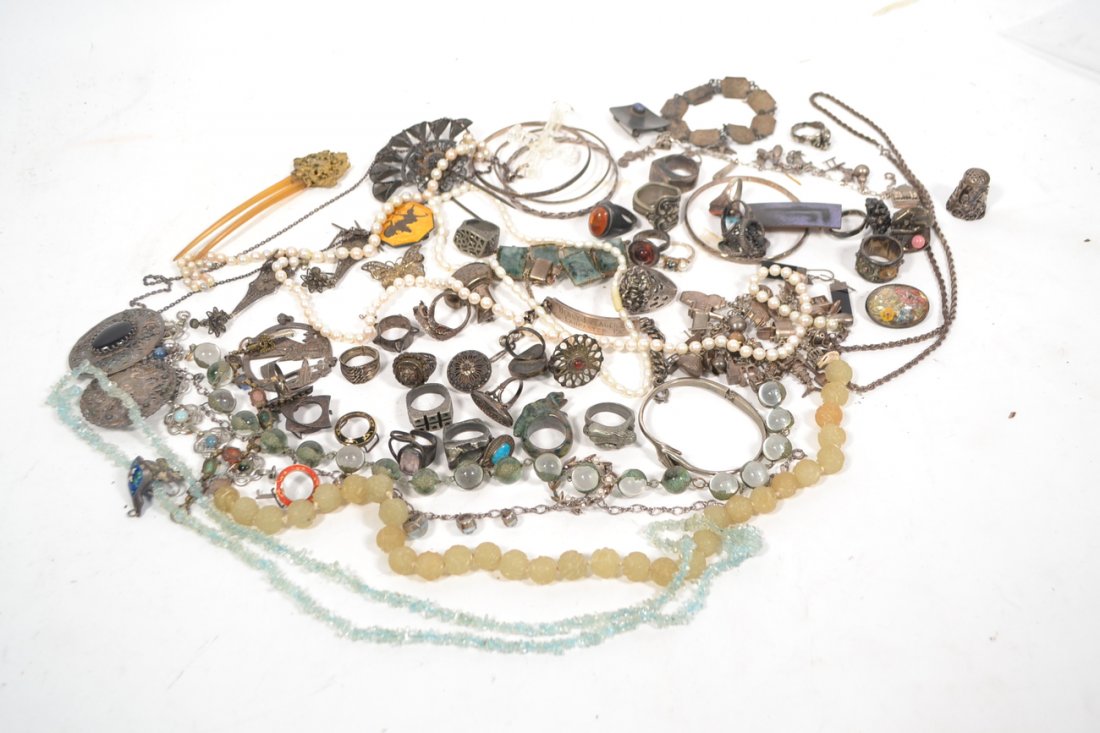 Assorted Silver and Other Jewelry: Includes rings, charm bracelets, chains, hair combs, beads, and more. 9 ozt weighable.