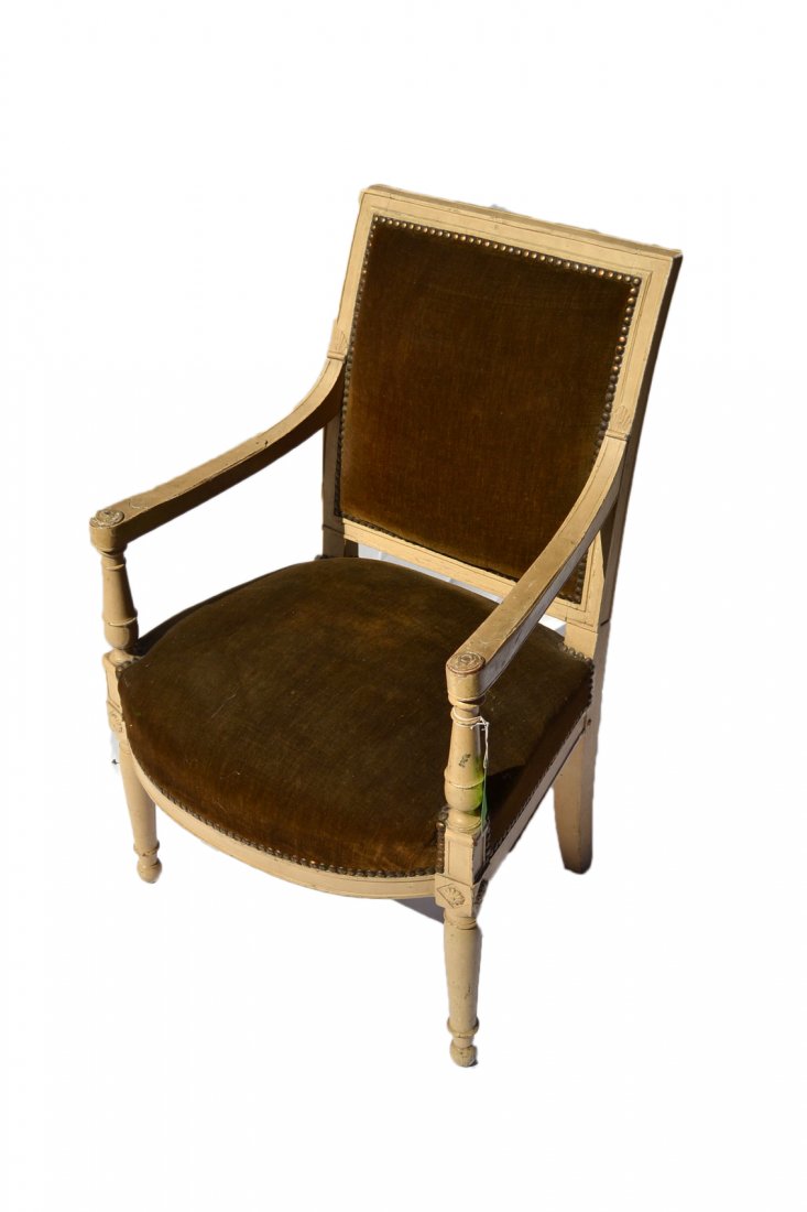 Vintage Louis XVI-Style Fauteuil: Creme painted open armchair with bow seat front and green velvet upholstery. [23" W x 21" D x 35 3/8" H]. Loose joints and wear with one missing rosette.