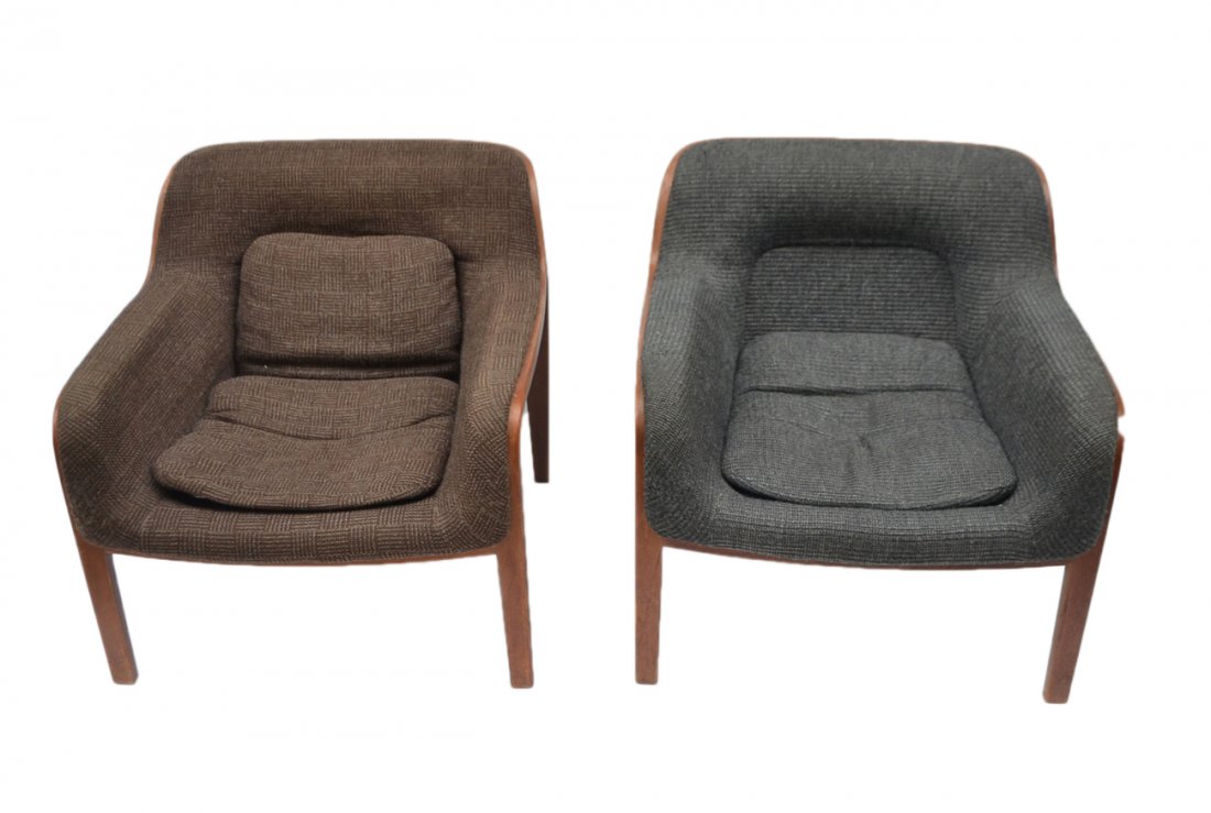 Two Knoll Lounge Chairs: Designed by Bill Stephens. Model # 1315. Laminated wood frame with grey and tan upholstery. [29 1/2" W x 29 1/2" D x 27 1/2" H]. Upholstery worn and torn.