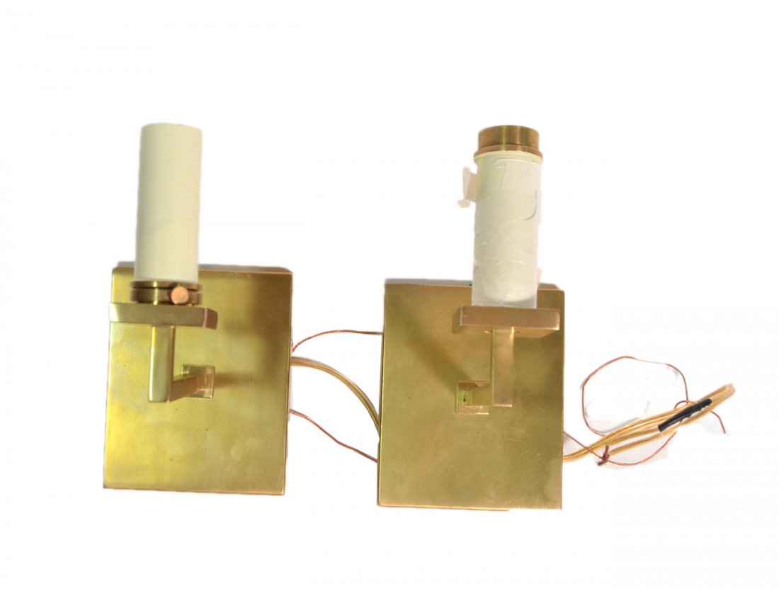 Pair Modern Bronze One Light Sconces: In the manner of Jules Leleu. Each bears Vaughan label on back. Light surface scratches.