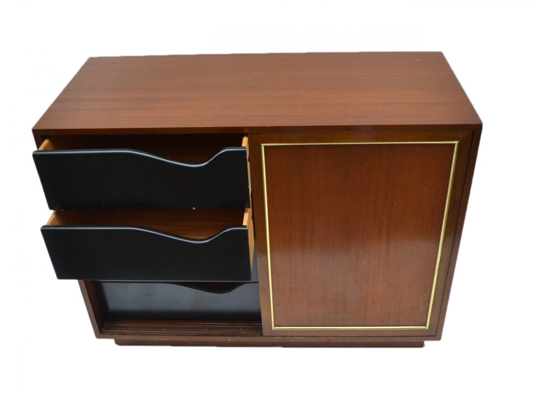 Harvey Probber Dresser: Mid-century walnut dresser. Marked Harvey Probber. Consists of eight black painted drawers with front sliding doors. [42" W 18" D x 32 1/2" H].