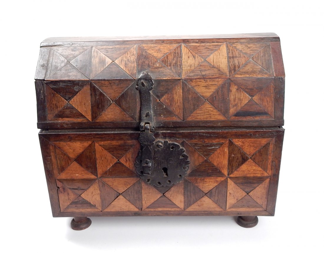 Continental Parquetry Box: Curious antique box with inlaid squares in dome form, sunburst and geometric inlays. Raised on four feet with hall marks. [5" x 8" x 10"].